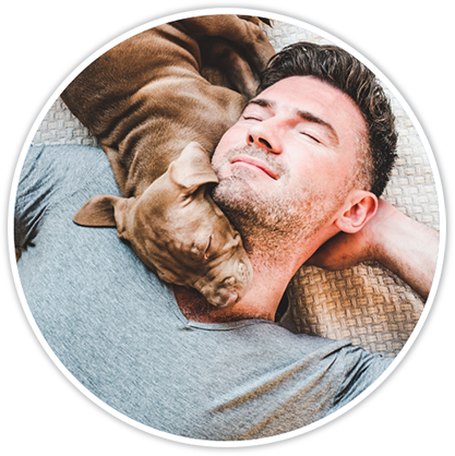 Man sleeping with a dog